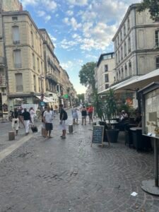 walking through Avignon historic centre with teenagers